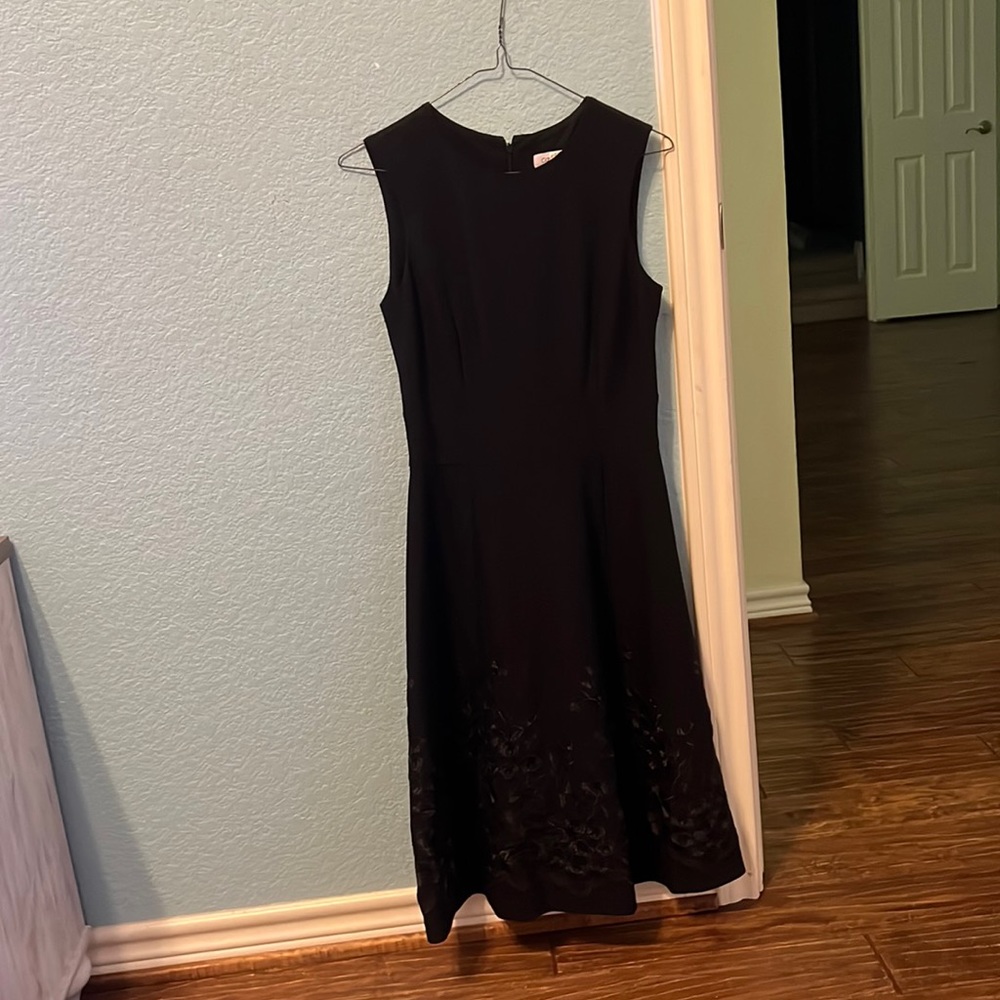 Blacking dress with imprinted flowers on the bottom
